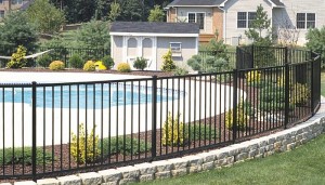 Pool fence and concrete pool deck